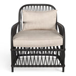 Front view of a Black Rattan Occasional Chair with Linen cushions in a Coastal Style from the Byron range by House of Curators