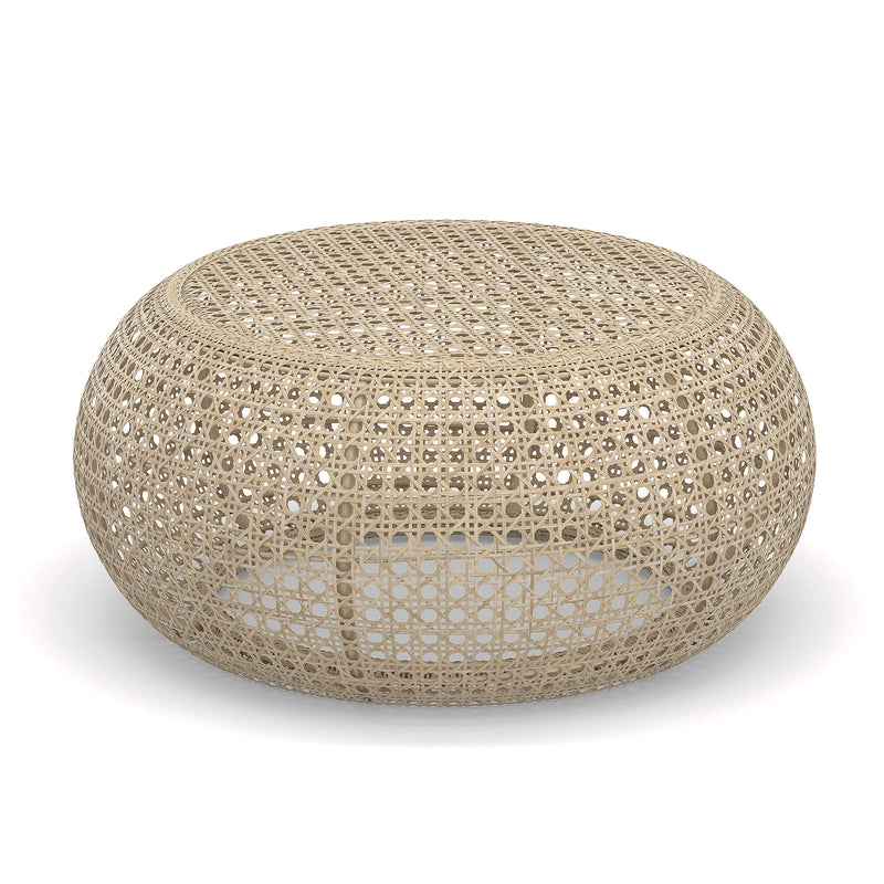 3/4 view of a round Wicker Coffee Table made from natural Rattan from the Cayman range by the House of Curators